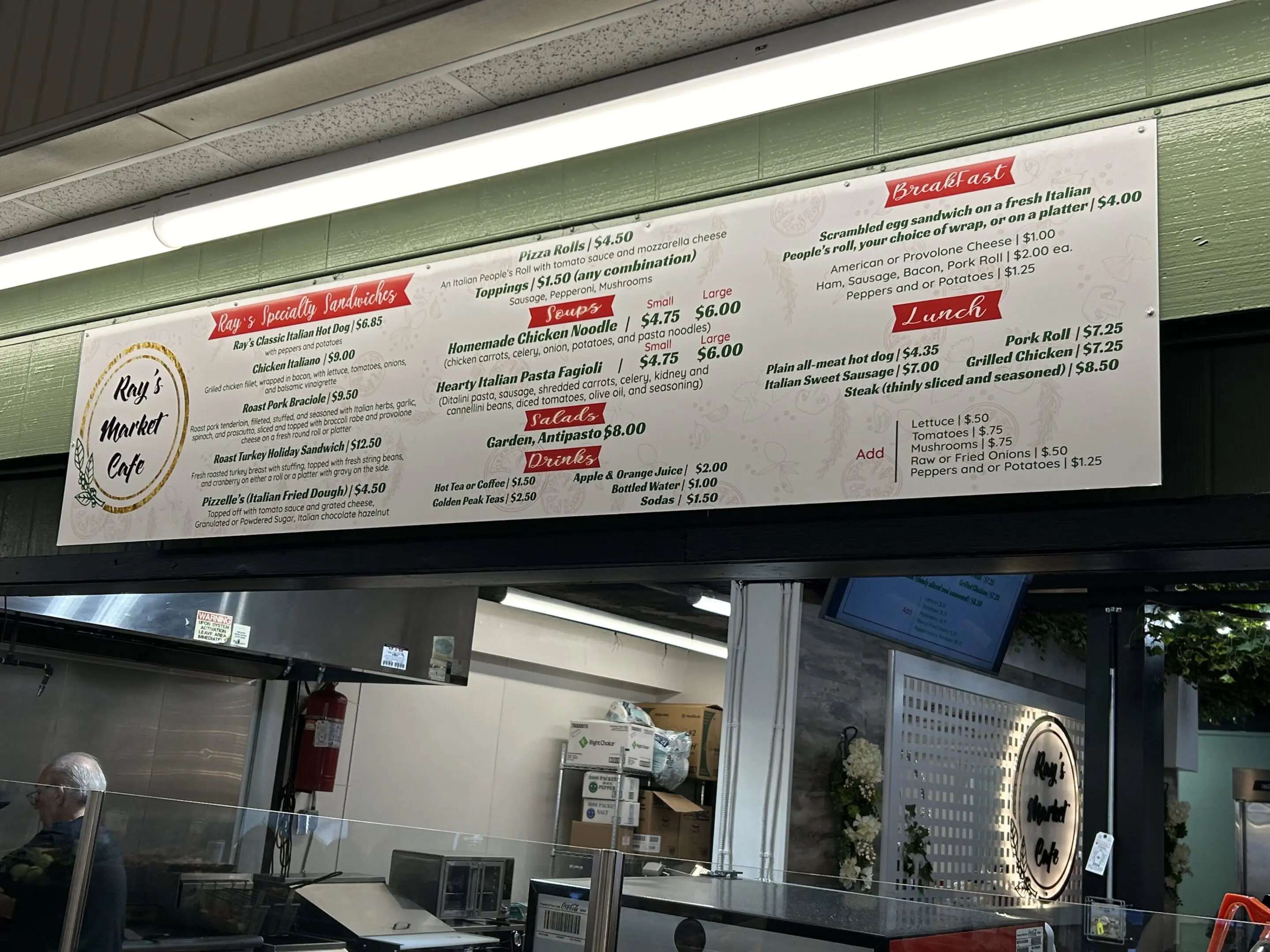 A restaurant menu with many different types of food.